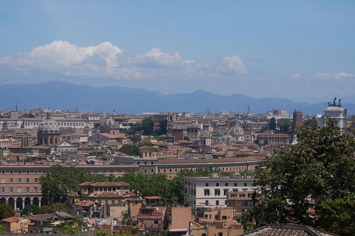 Rome's rooftops running out to the hills beyond the city