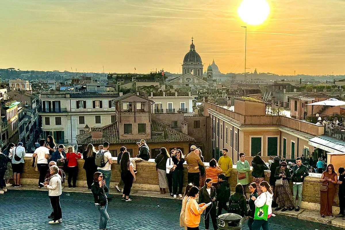Rome's rooftops and St Peter's dome from the Pincio terrace at sunset